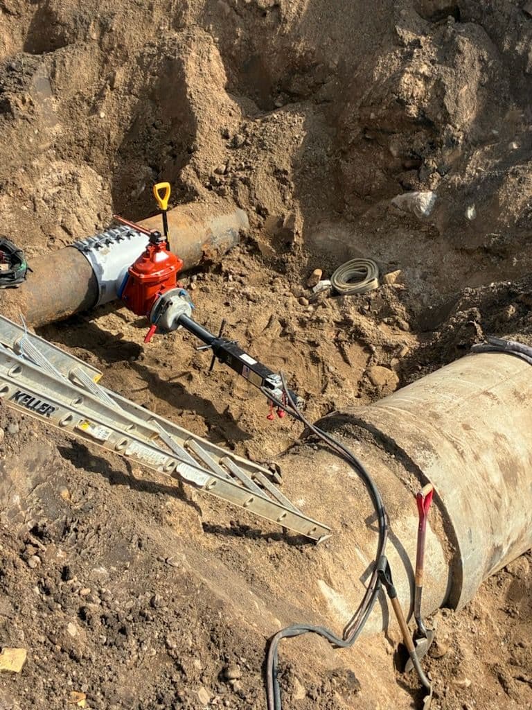 Project 18x8 Wet Tap Squeezed Between a Water Main and 48" Storm Sewer image