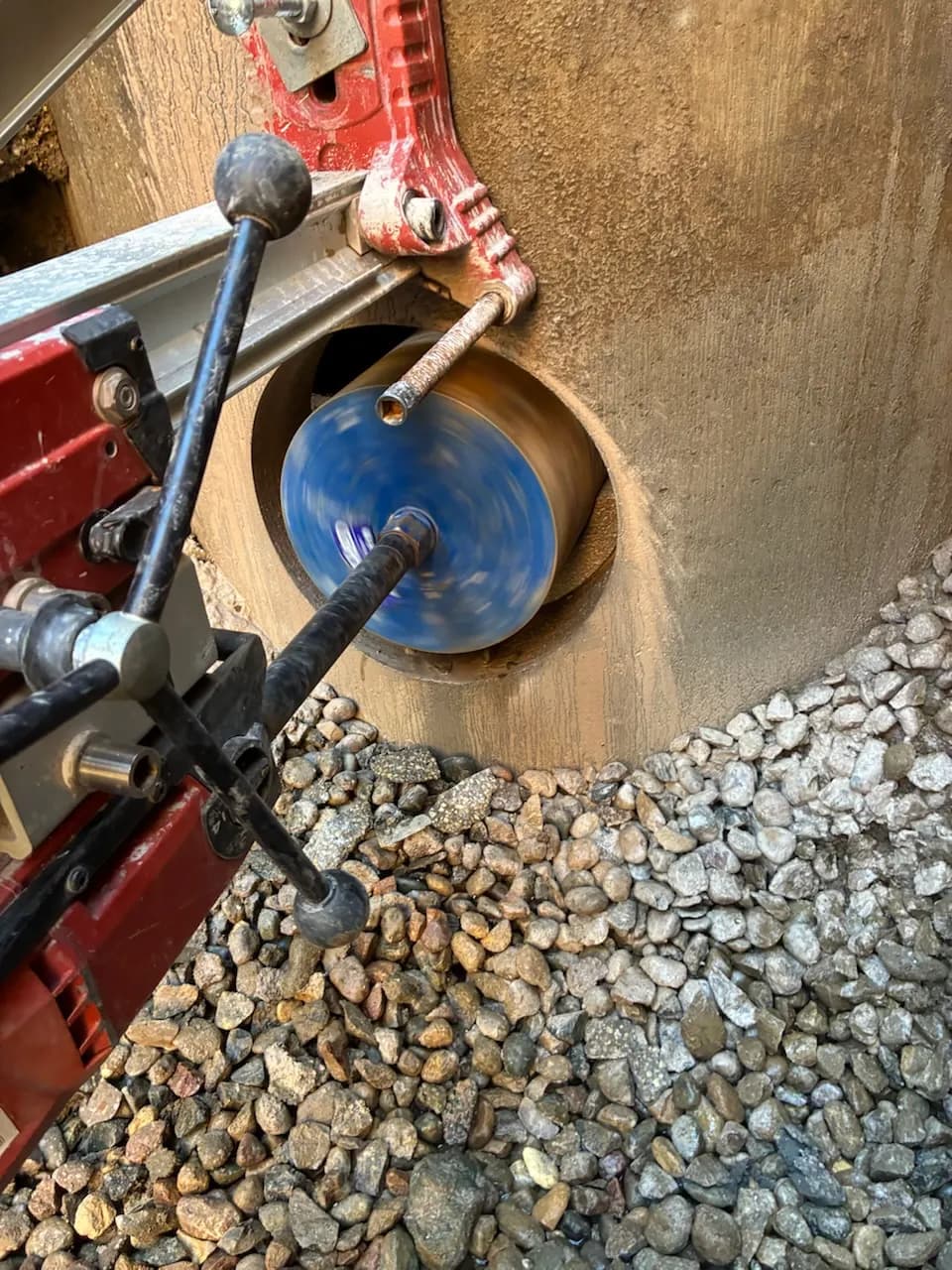 16" and 12" Core Drilling Inside a Sanitary Manhole in Jordan MN image