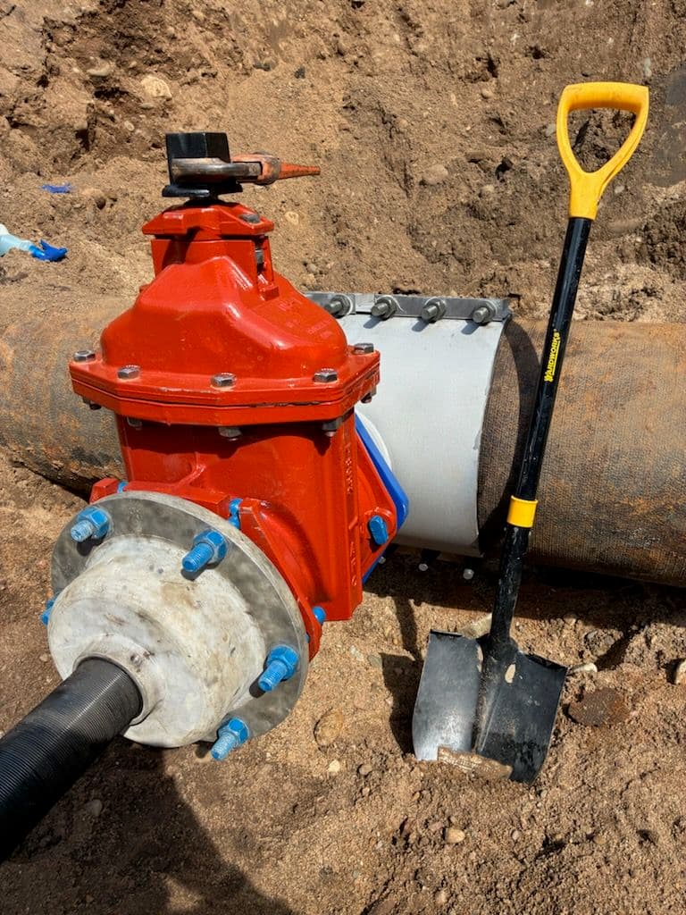 Gallery photos for 18x8 Wet Tap Squeezed Between a Water Main and 48" Storm Sewer: Image #1