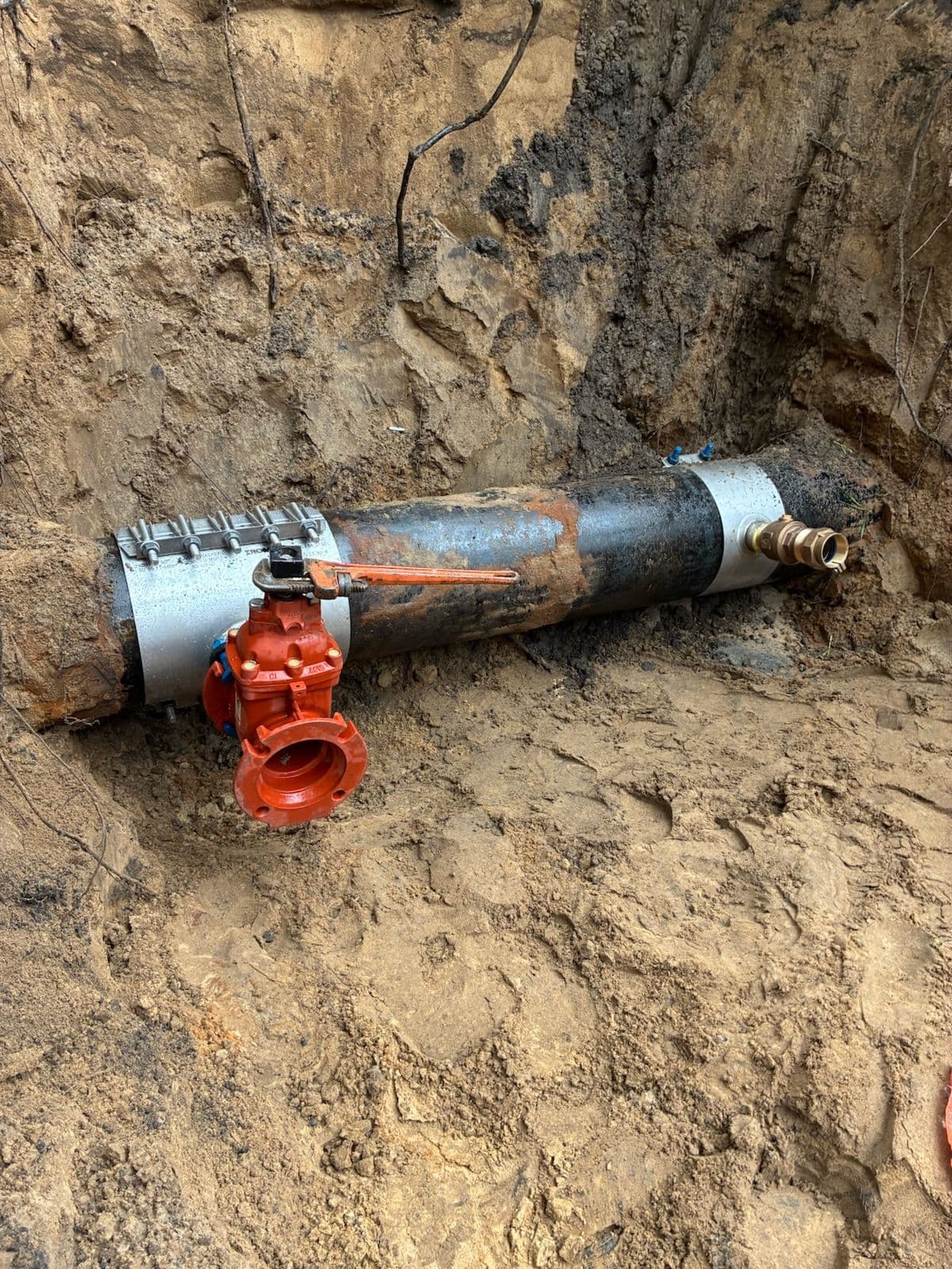 12-Inch Cast Iron Wet Taps Completed in Mounds View image