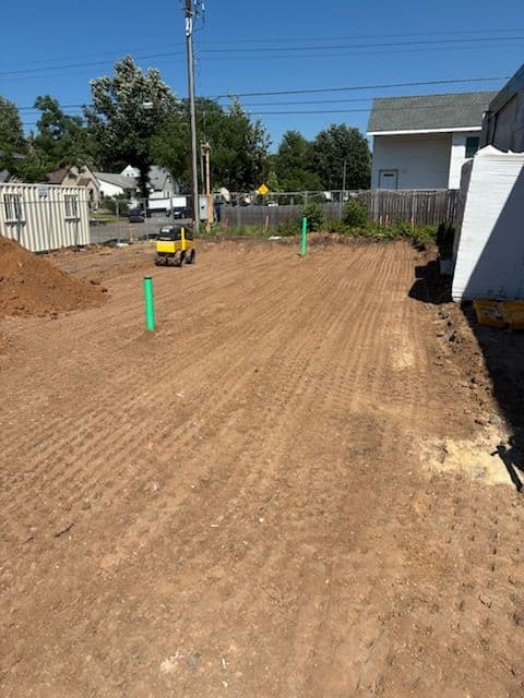 Gallery photos for Underground Filtration Pond Keeps This Tight Building Site Moving: Image #1