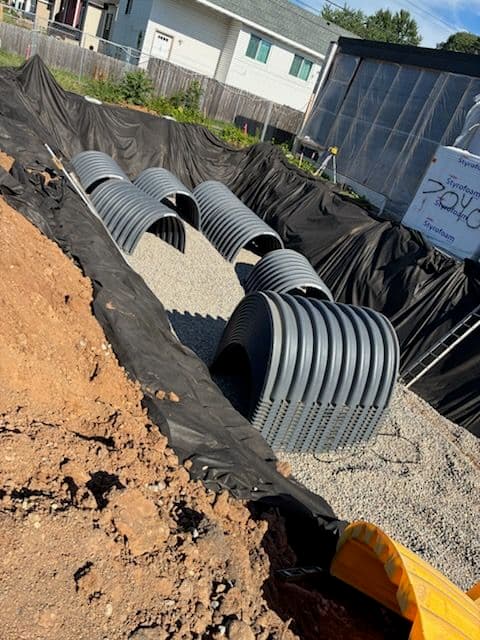 Gallery photos for Underground Filtration Pond Keeps This Tight Building Site Moving: Image #2